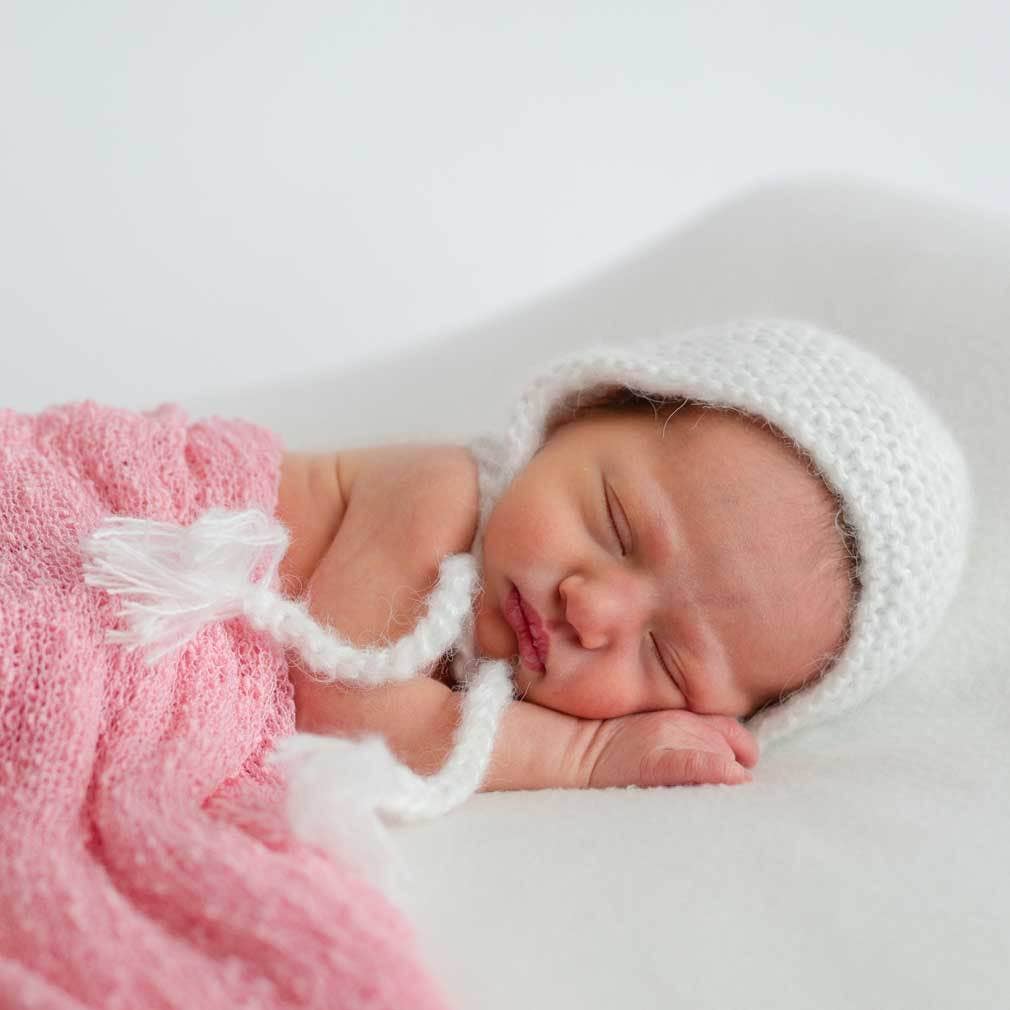 Huggalugs - Newborn White Angora Knit Bonnet