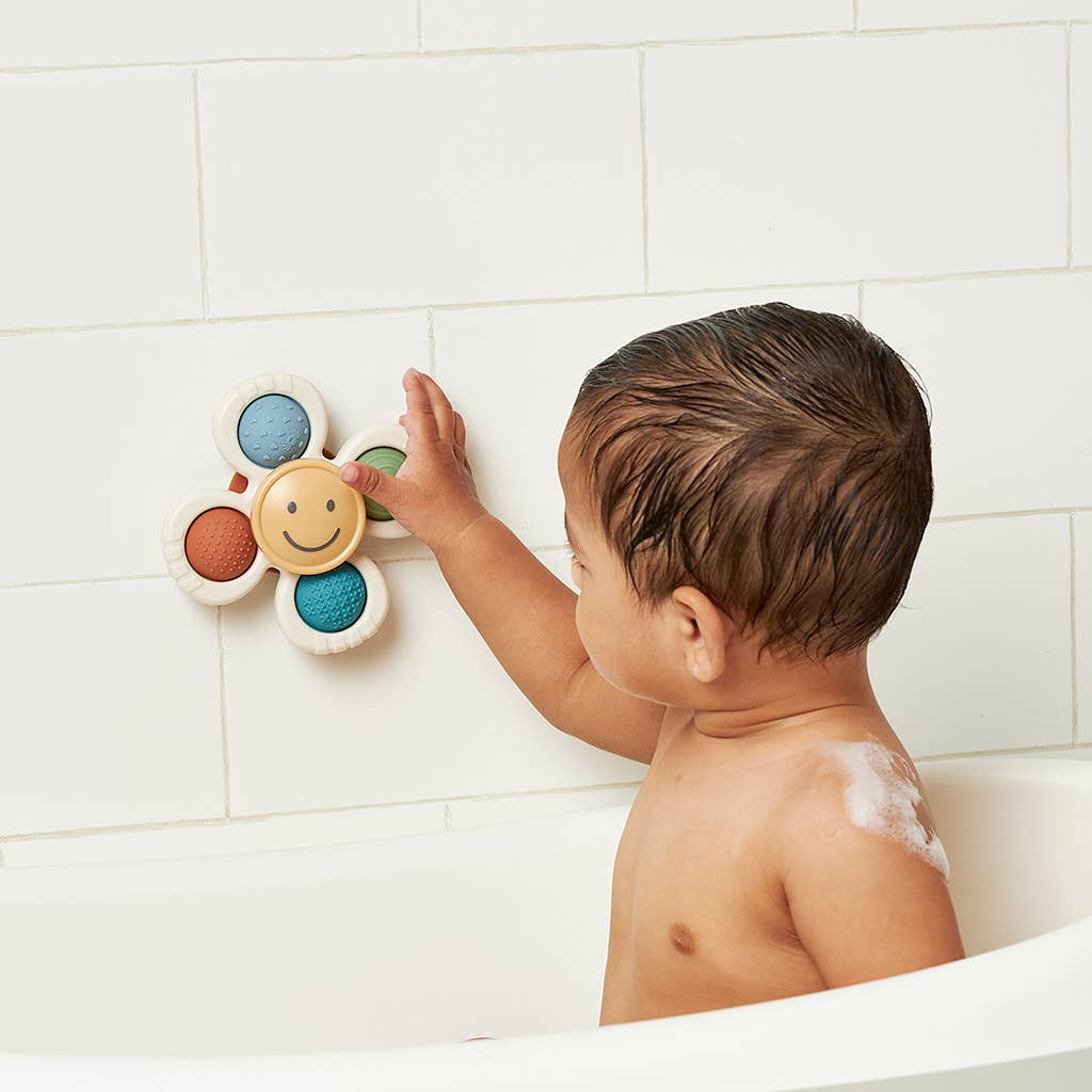 Itzy Ritzy - Itzy Pop & Whirl™ - Bath + Travel Toy: Smile